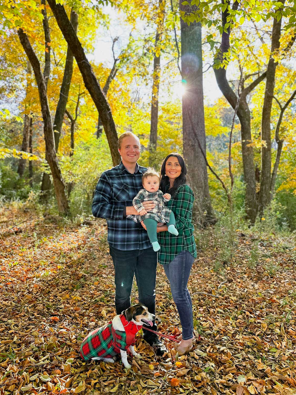A family portrait taken with phone in a beautiful fall setting