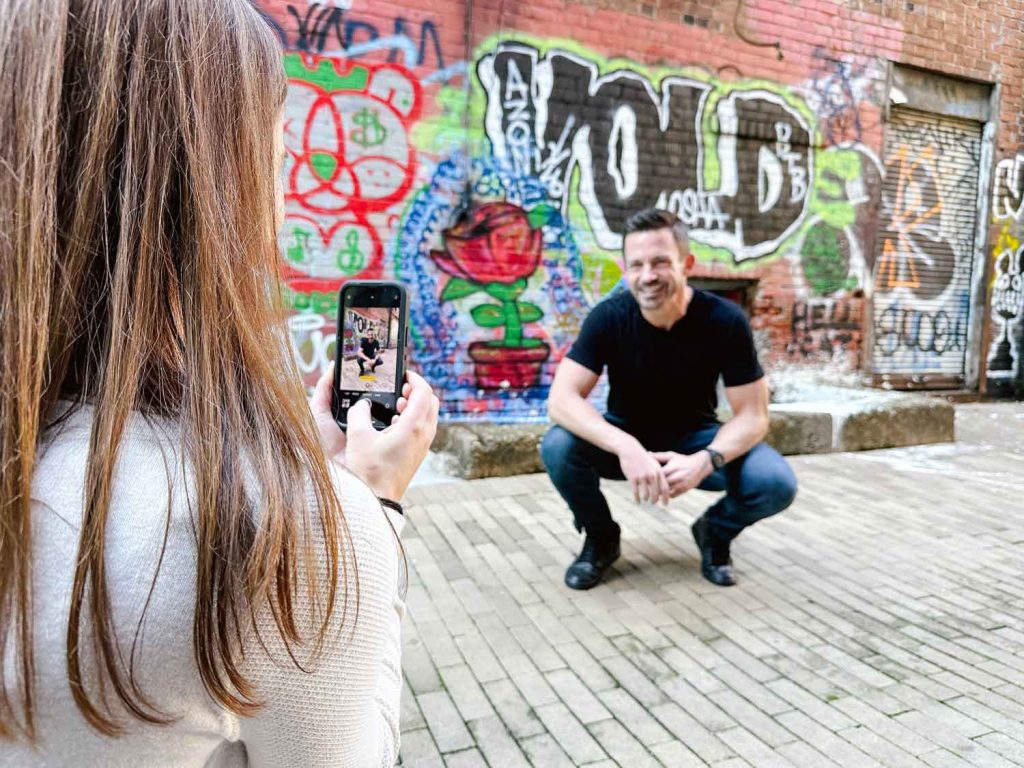 be a photographer using a phone